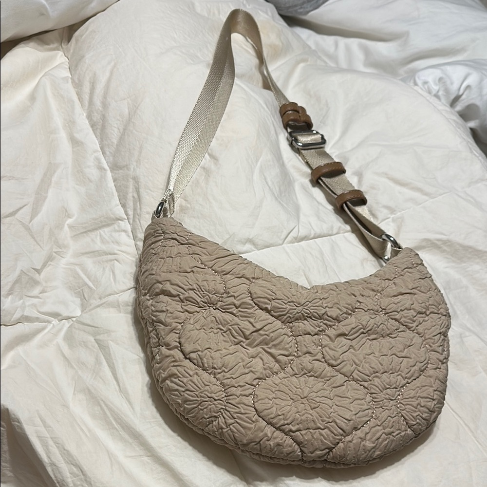 Tan Quilted Crescent Shoulder Bag